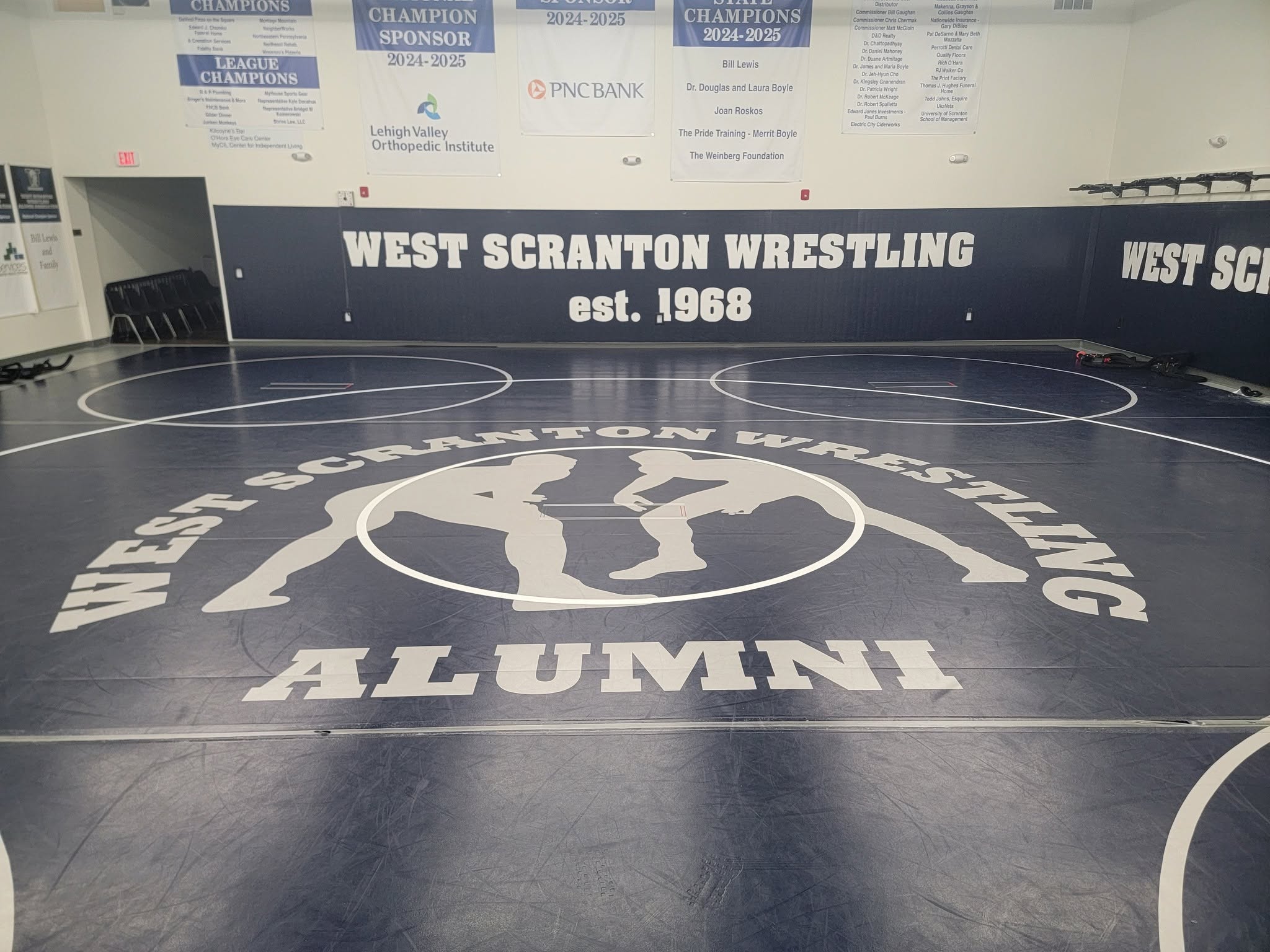 Wrestling room with championship banners